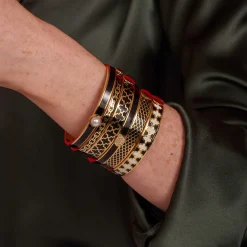 Agama Black & Gold Hinged Enamel Bangle | Halcyon Days