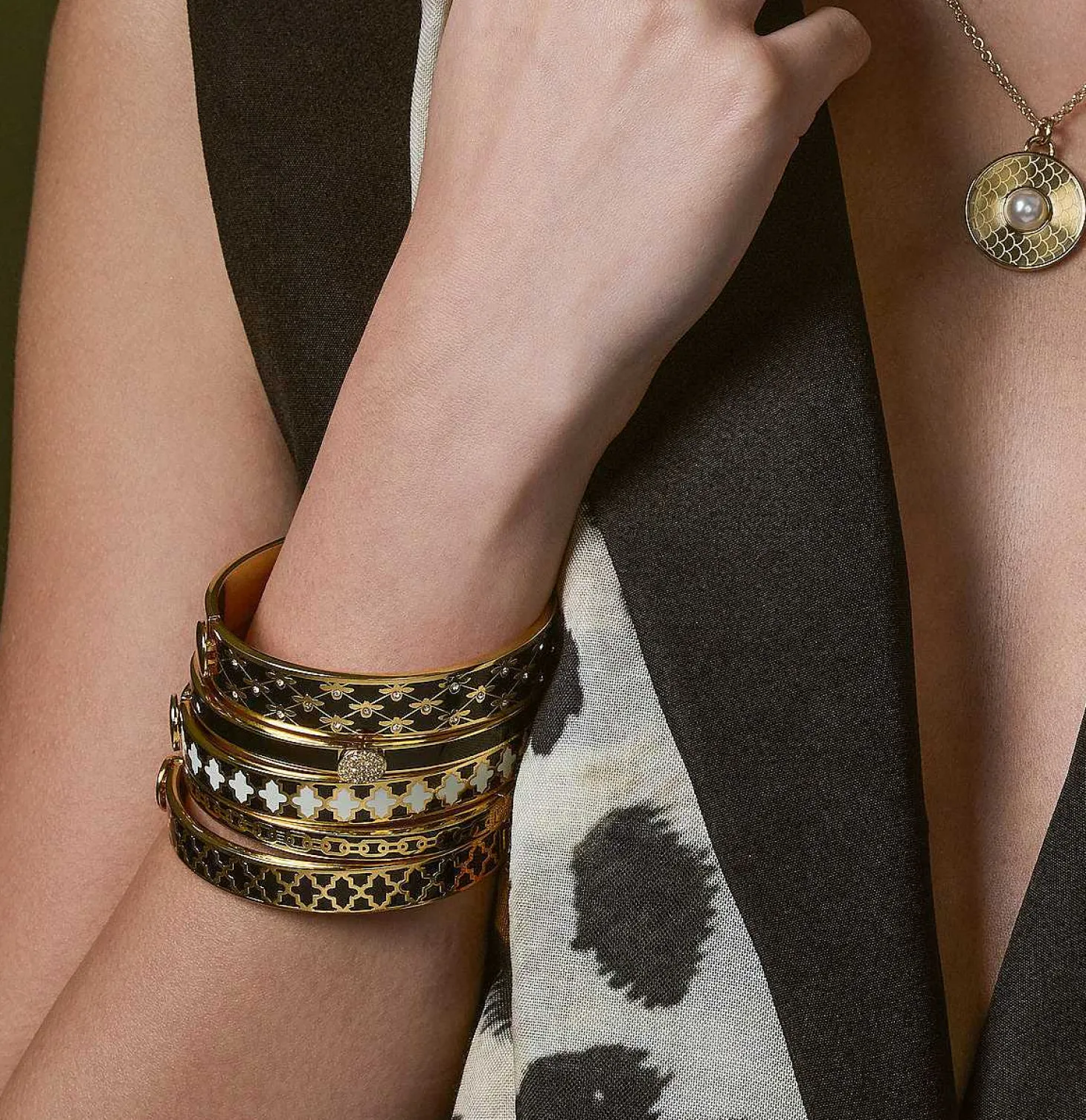 Agama Black, Cream Gold Hinged Enamel Bangle | Halcyon Days