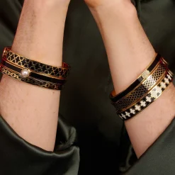 Agama Black, Cream Gold Hinged Enamel Bangle | Halcyon Days